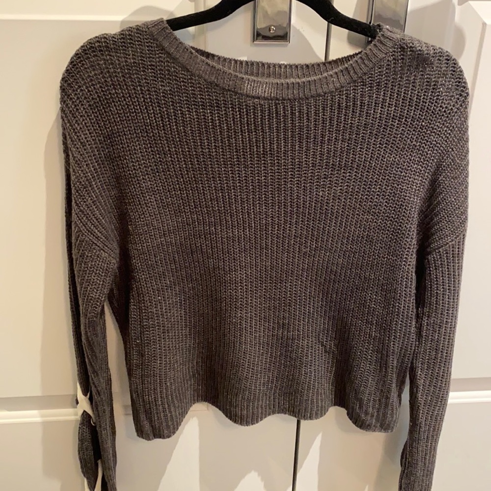 Sweater with laced arm detail